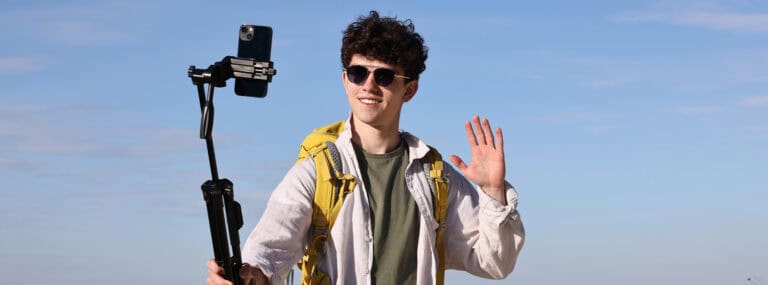man using CR202-Lite portable 4G LTE router for uninterrupted live outdoors broadcast