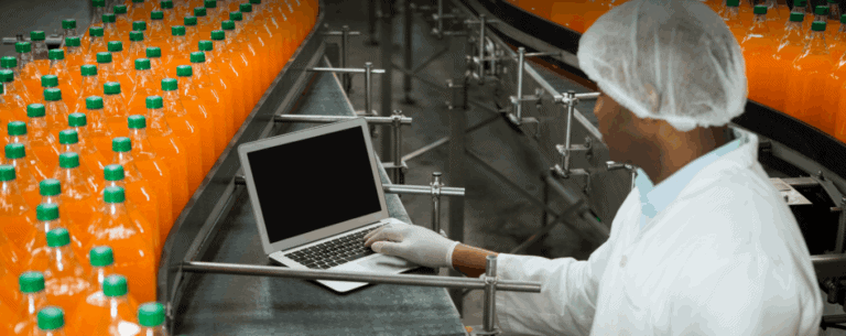 Automated beverage production line showcasing industrial IoT integration for efficient data collection and processing.