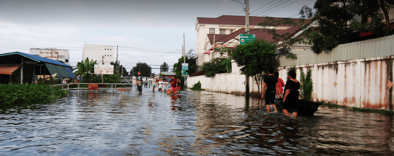 Industrial flood warning system monitoring river water levels with sensors in Thailand during heavy rains